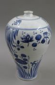 A Chinese blue and white porcelain vase. 42 cm high.