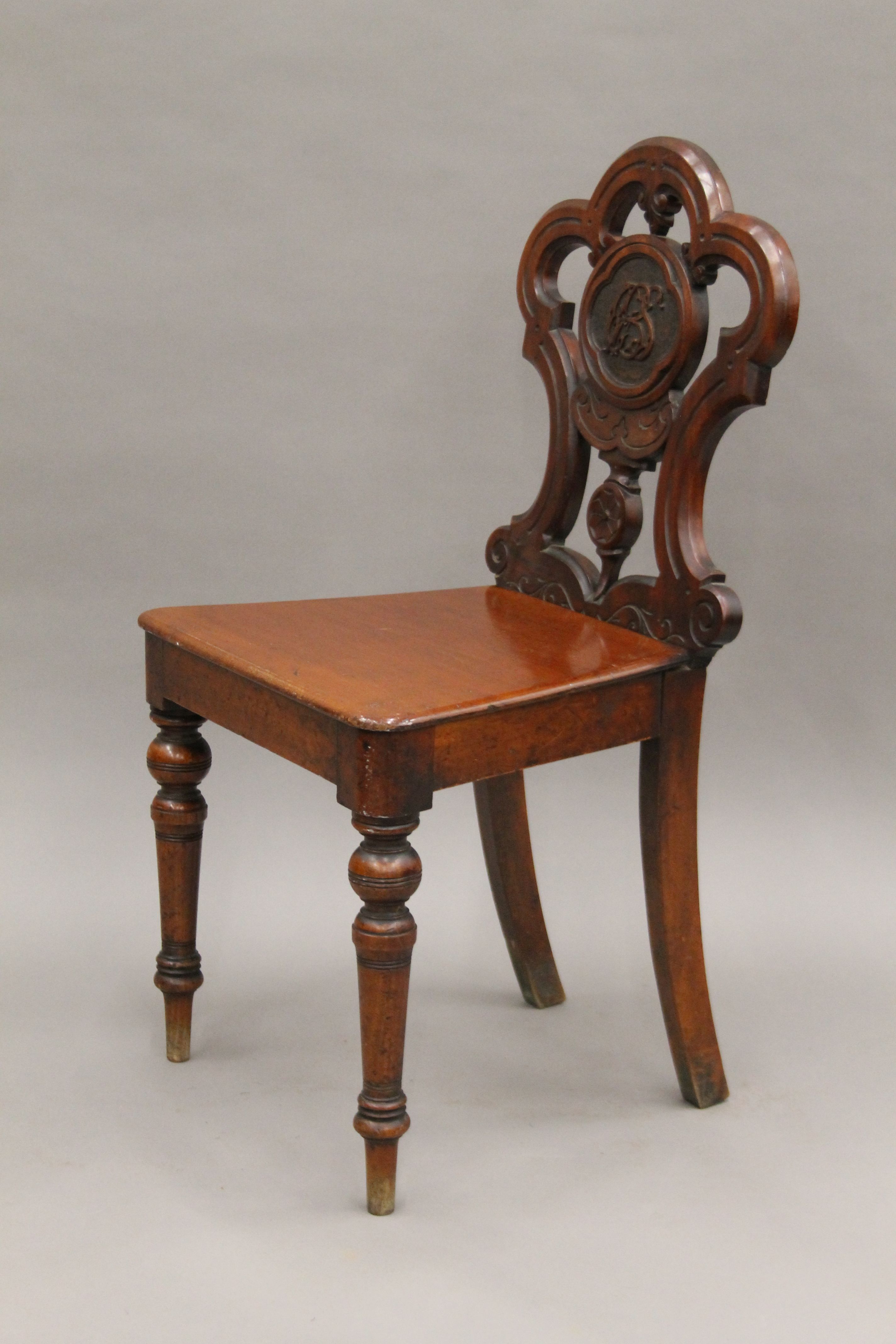 A Victorian mahogany hall chair. 46 cm wide. - Image 2 of 5