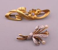 An Art Nouveau 15 ct gold and diamond flower design brooch, hallmarked for Birmingham 1905,