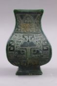 An archaic style Chinese vase. 18 cm high.