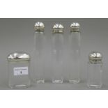 Five cut glass and silver topped Asprey and Co jars, hallmarked for London 1880,
