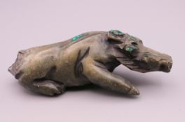 A carved hardstone model of a wild boar. 11 cm long.