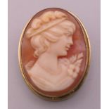 An 800 silver cameo brooch. 3 cm high.