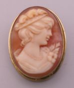 An 800 silver cameo brooch. 3 cm high.