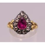 A 15 ct gold (tested) ruby and rose cut diamond ring. Ring size M/N.