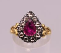 A 15 ct gold (tested) ruby and rose cut diamond ring. Ring size M/N.
