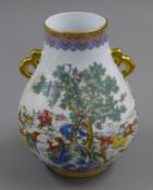 A Chinese porcelain vase decorated with deer. 22 cm high.