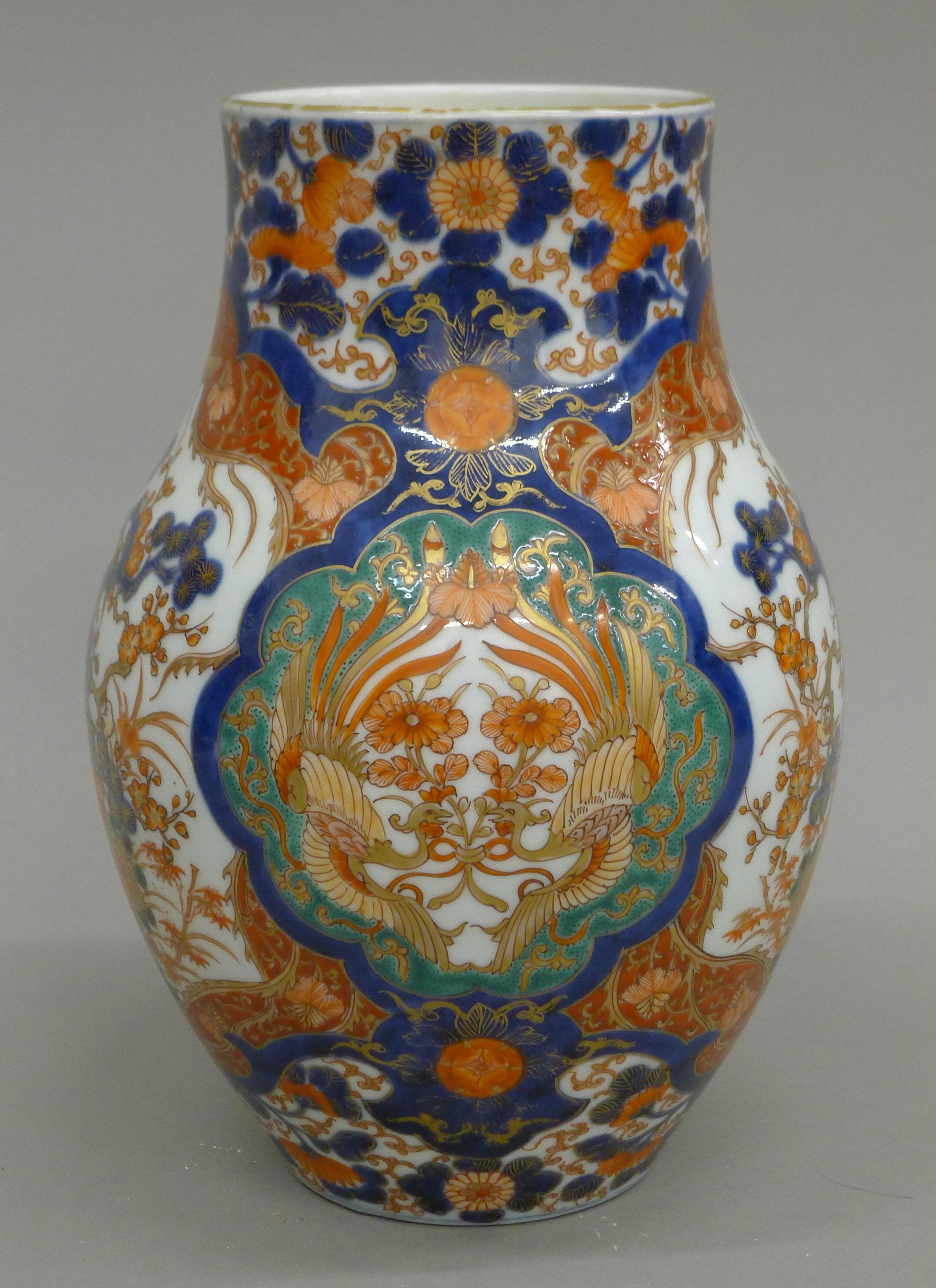 A 19th century Japanese Imari porcelain vase. 24.5 cm high. - Image 3 of 7
