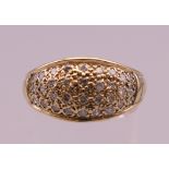 A 9 ct gold diamond ring. Ring size S/T. 6 grammes total weight.