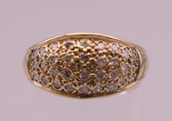 A 9 ct gold diamond ring. Ring size S/T. 6 grammes total weight.