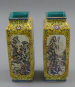 A pair of Chinese square yellow ground porcelain vases. 30 cm high.