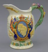 A 1937 musical Coronation jug. 20 cm high.