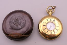 A ladies 18 C gold half hunter pocket watch. 56.7 grammes total weight.