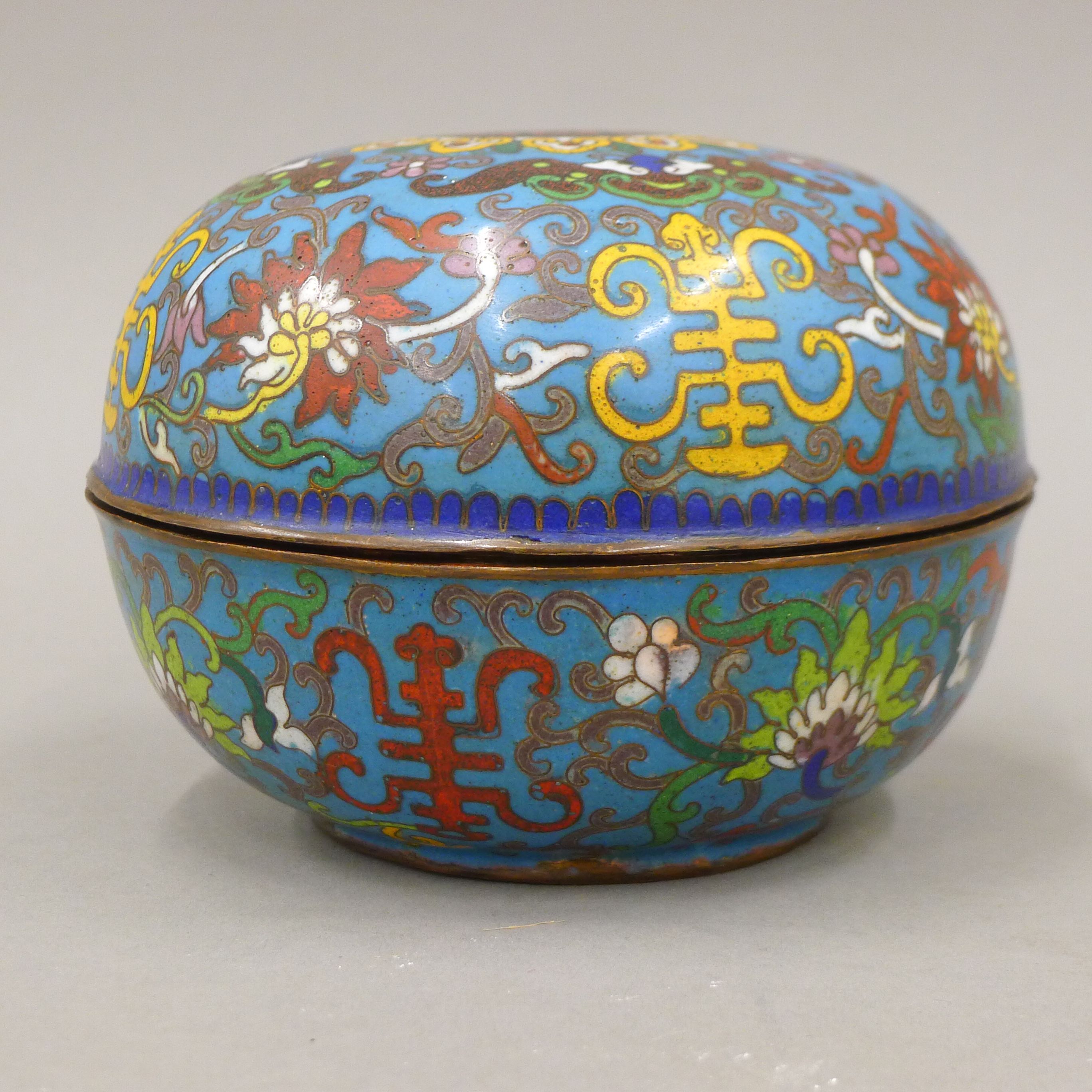 A 19th century Chinese blue ground bun shaped cloisonne box and cover, decorated with symbols, - Image 2 of 6