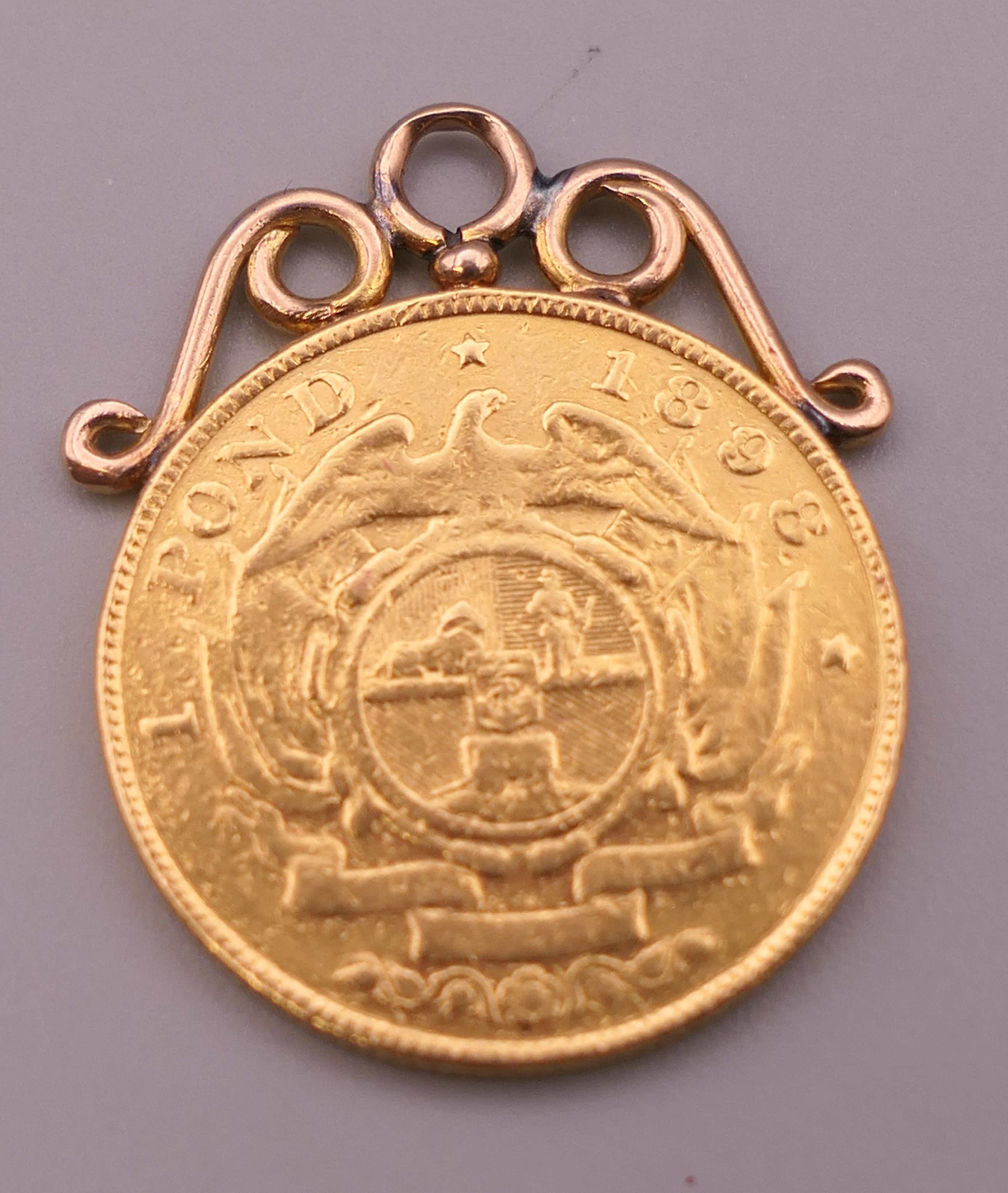 A South African 1898 gold 1 pond coin, with suspension mount. Coin 2 cm diameter. 8. - Image 2 of 2