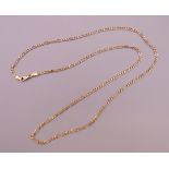 A 9 ct gold figaro chain. Approximately 52 cm long. 4.3 grammes.