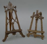 Two 19th century Blackforest carved table easels. The largest 22 cm high.