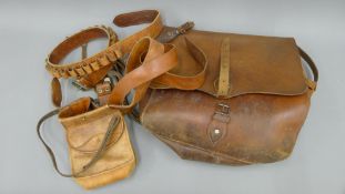 A quantity of leather goods, including bags, ammunition belts, etc.