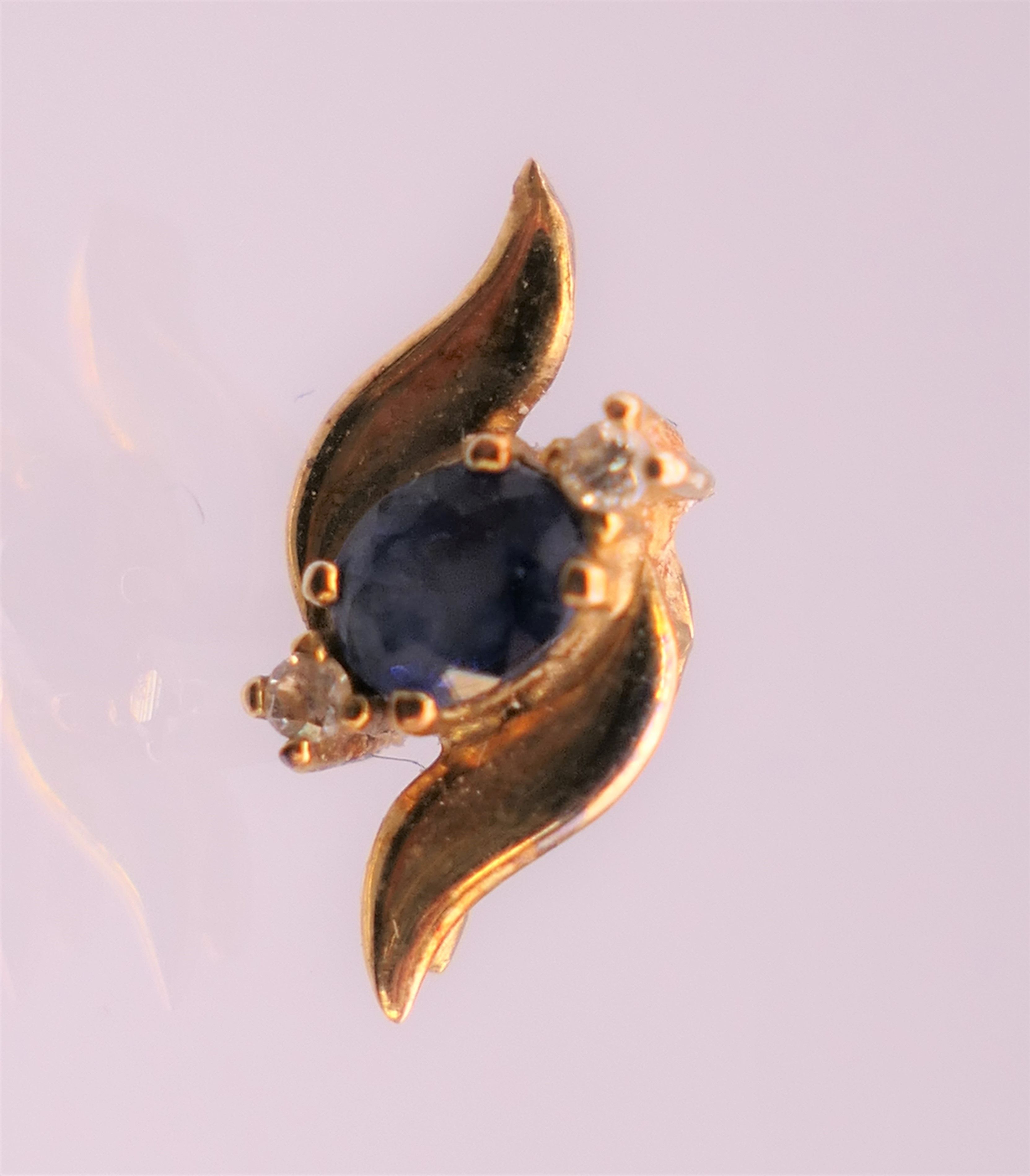 A pair of gold sapphire and diamond earrings. 1 cm high. - Image 3 of 4