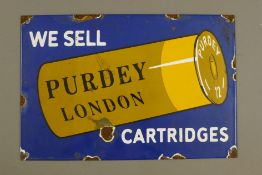 An enamel Purdy sign. 30 cm wide.