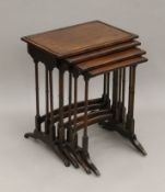 A late 19th/early 20th century nest of four mahogany tables. 49.5 cm wide.