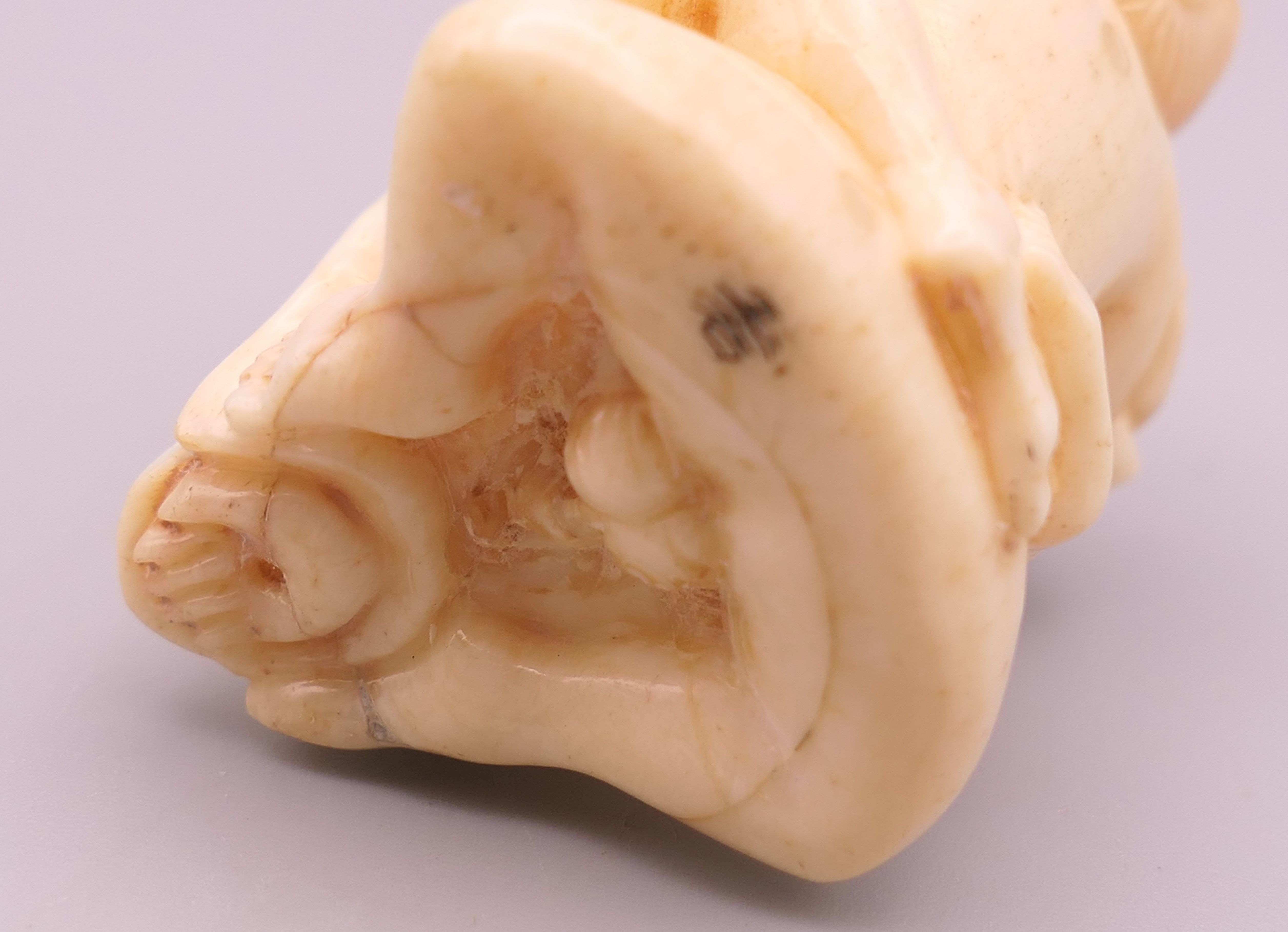 An erotic bone carving. 4 cm high. - Image 3 of 3