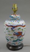 A Chinese porcelain vase and cover, mounted as a lamp. 42 cm high.