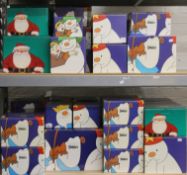 A large quantity of boxed Coalport The Snowman and Father Christmas porcelain figures.