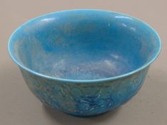 A Chinese blue porcelain dragon bowl. 15.5 cm diameter.