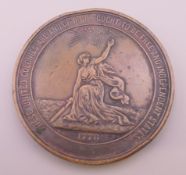 An 1876 100th Anniversary of American Independence medallion. 5.75 cm diameter.