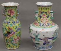 Two Chinese porcelain vases. Each approximately 25.5 cm high.