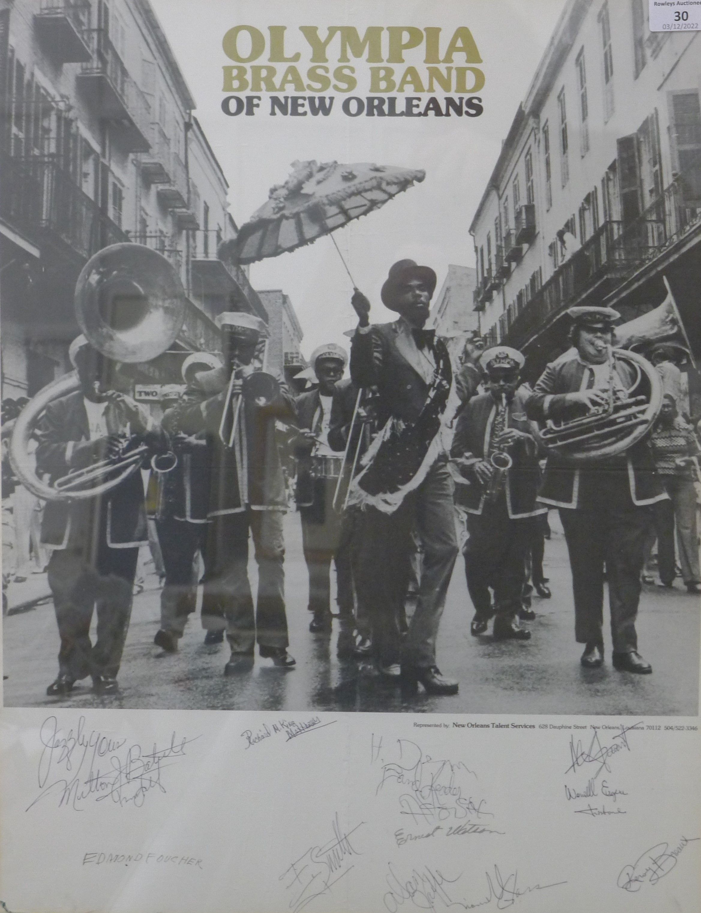 A signed Olympia brass band of New Orleans poster, glazed. 43 x 55.5 cm. - Image 2 of 2