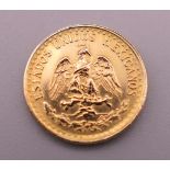 A 1945 Mexico gold coin. 1.6 grammes.