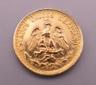 A 1945 Mexico gold coin. 1.6 grammes.