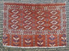 A vintage camel bag rug. 106 x 75 cm.