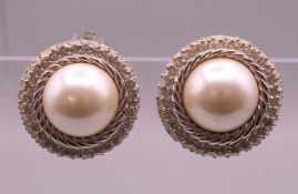 A pair of Christian Dior clip earrings. 2.5 cm diameter.