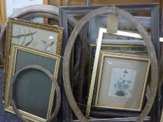 A quantity of frames, mirrors and prints.
