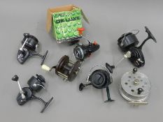 A quantity of fishing reels.