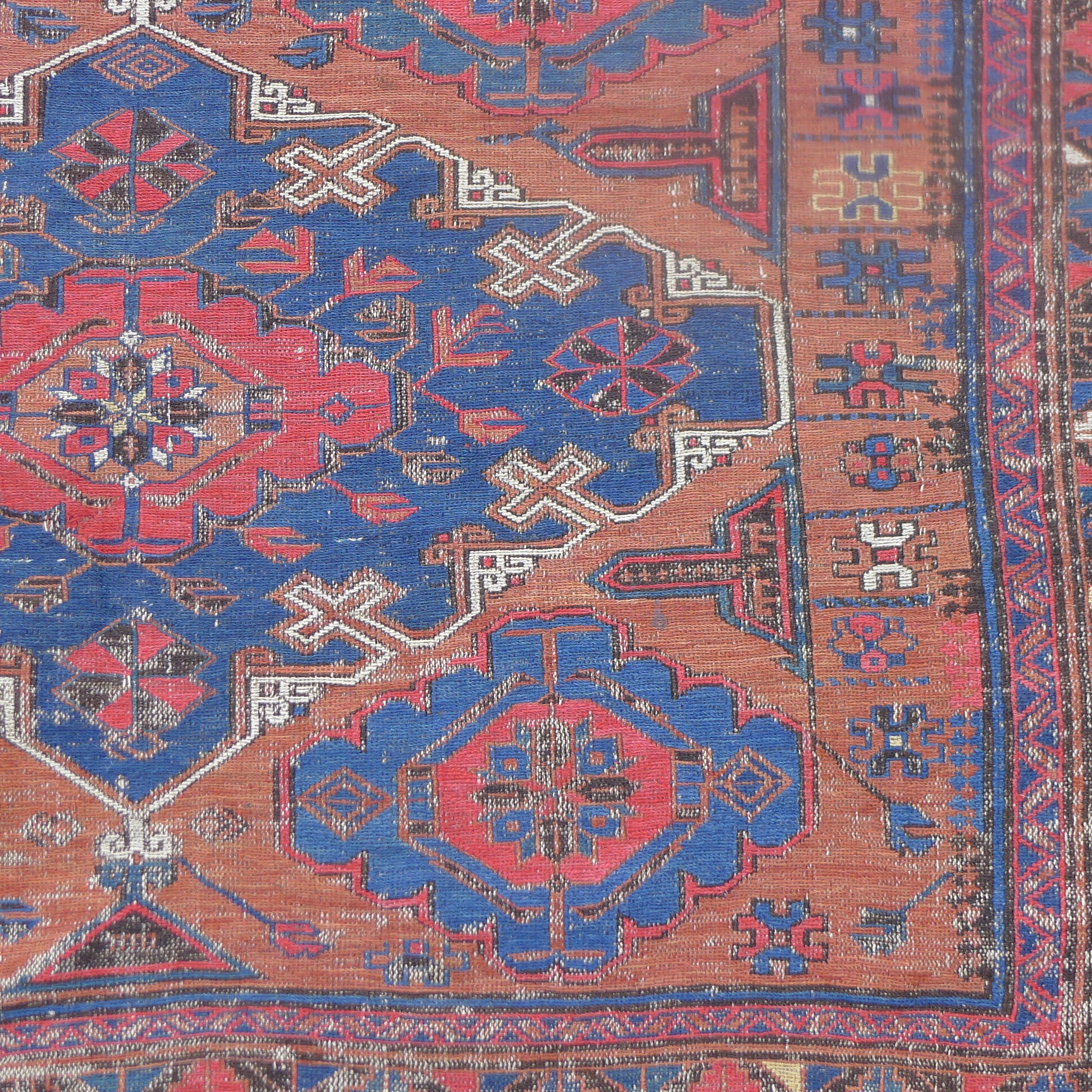 A Sumak Kilim red ground rug. 170 x 124 cm. - Image 2 of 3