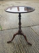 A George III mahogany tripod table. 61.5 cm diameter.