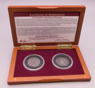 Two boxed Charles III Spanish silver coins (pieces of eight),