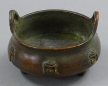 A small Chinese bronze censer. 8.5 cm diameter.