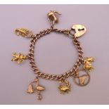 A 9 ct gold charm bracelet. Approximately 14 cm long. 18.4 grammes.