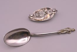 Two Continental silver cutlery items: two spoons folding into each other and a Continental silver