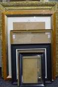 A quantity of picture frames.