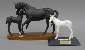 Two Beswick models, Adventure and Black Beauty and foal. The latter 19 cm high.