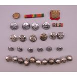 A quantity of various firemen's and military buttons.