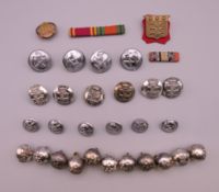 A quantity of various firemen's and military buttons.
