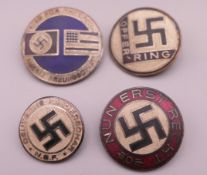 Four Nazi type badges. Largest 2.5 cm diameter.