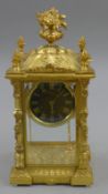 A gilt bronze regulator clock. 40 cm high.